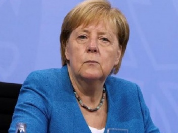 Меркель передала дела новому канцлеру Германи...